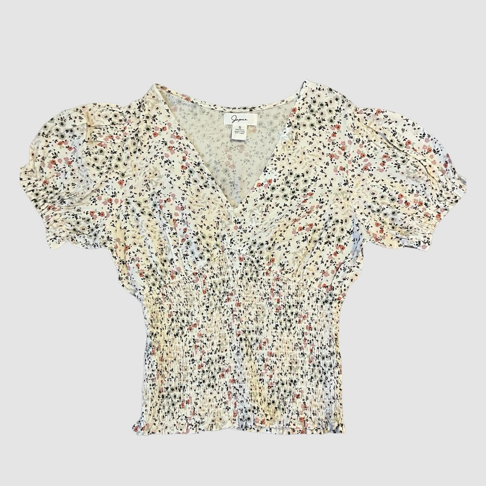 Crème colored floral corset style top